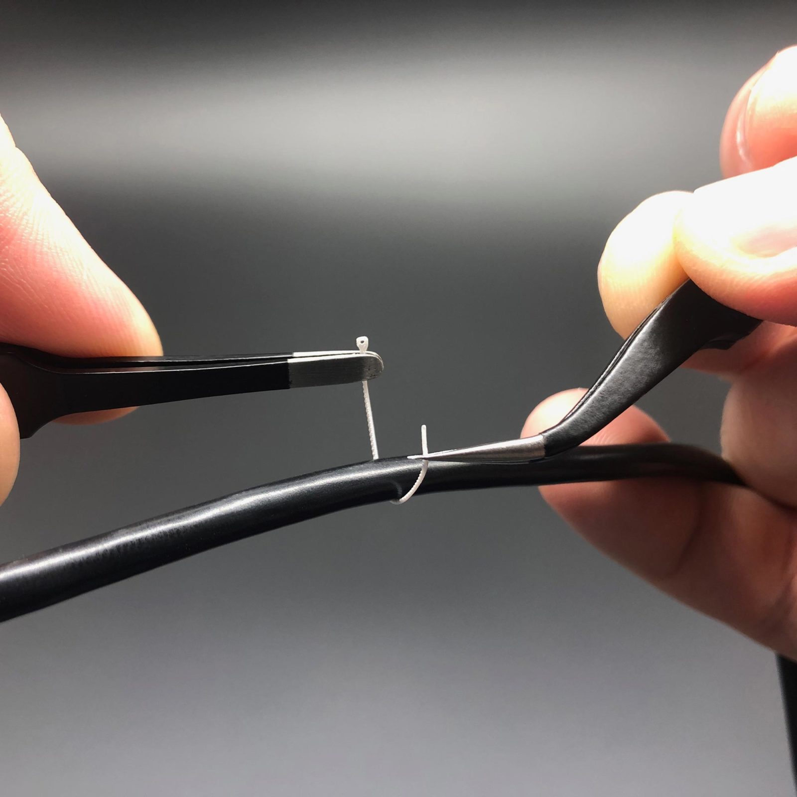 Handling Mini Cable Ties using tweezers