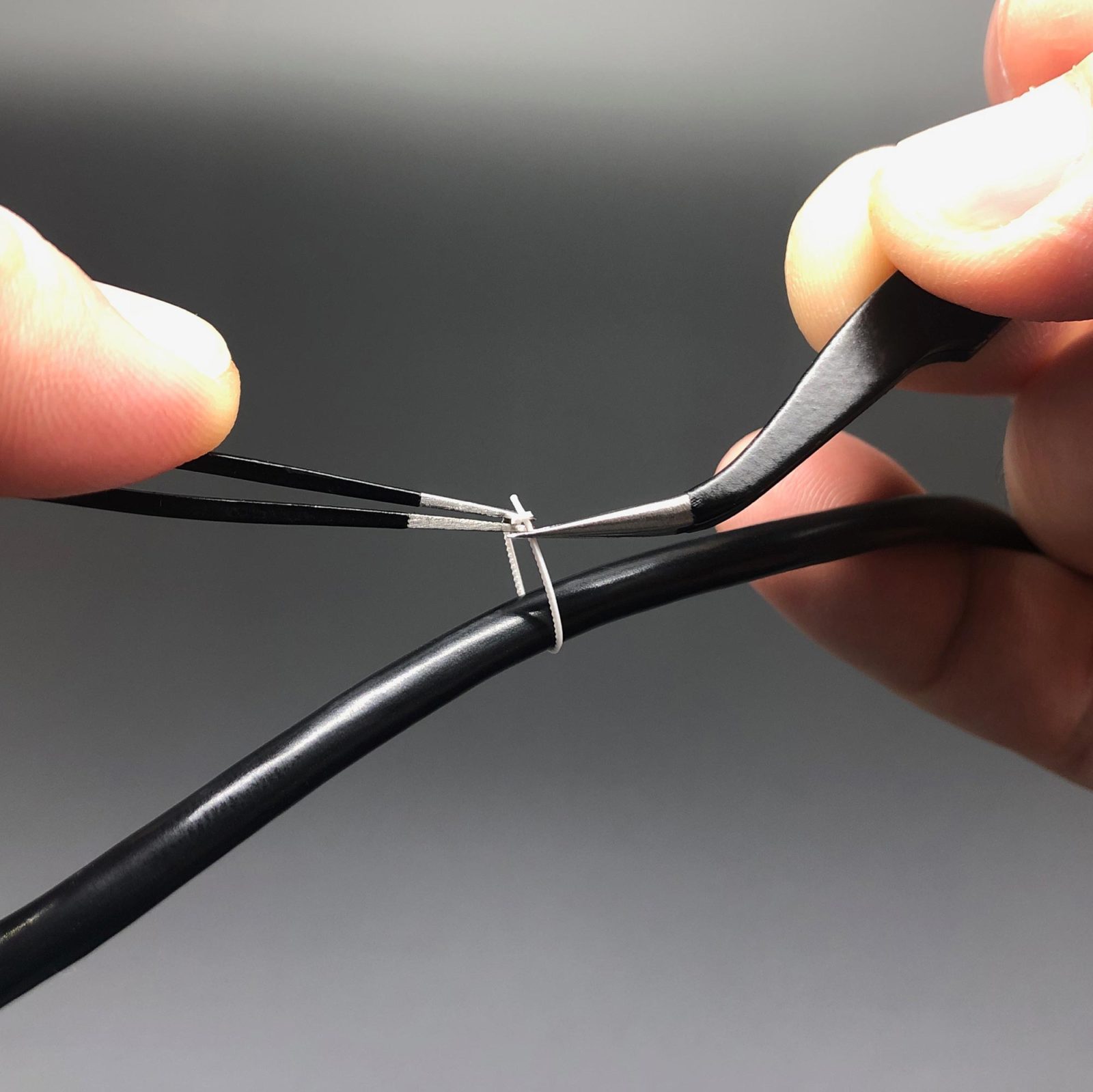 Closing Mini Cable Ties with tweezers
