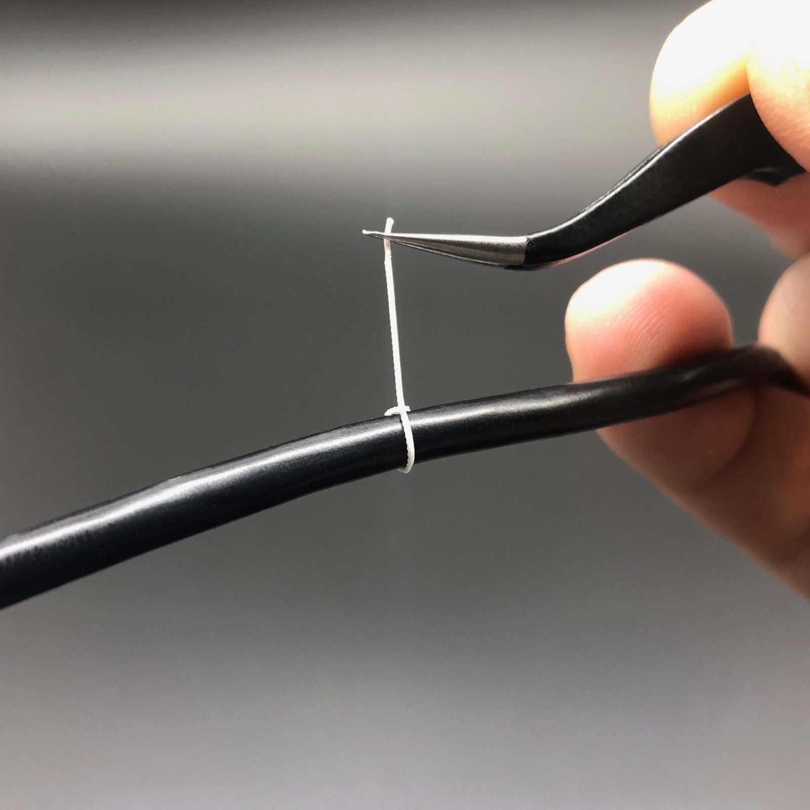 Tightening Mini Cable Ties using tweezers