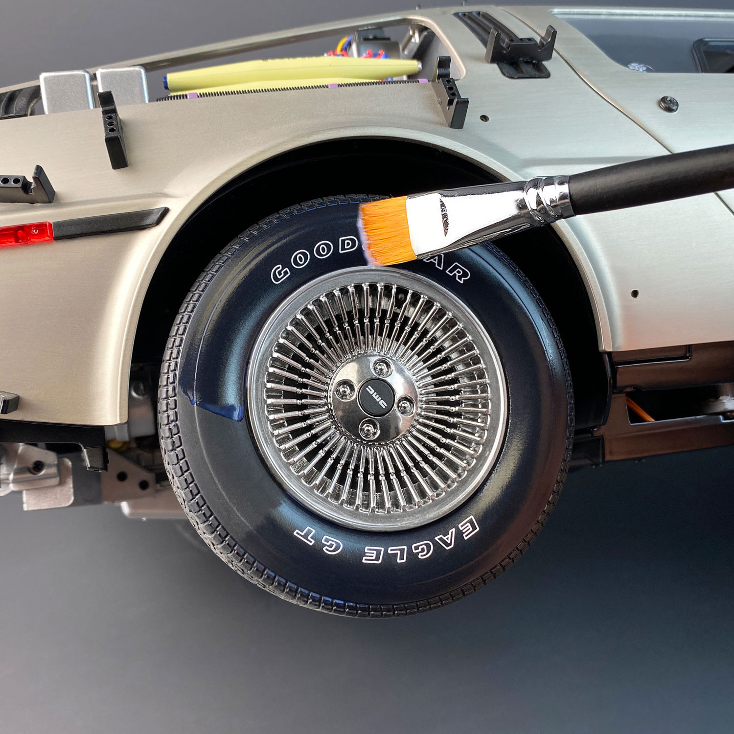 Applying Model Tyre Dressing to DeLorean model tyre