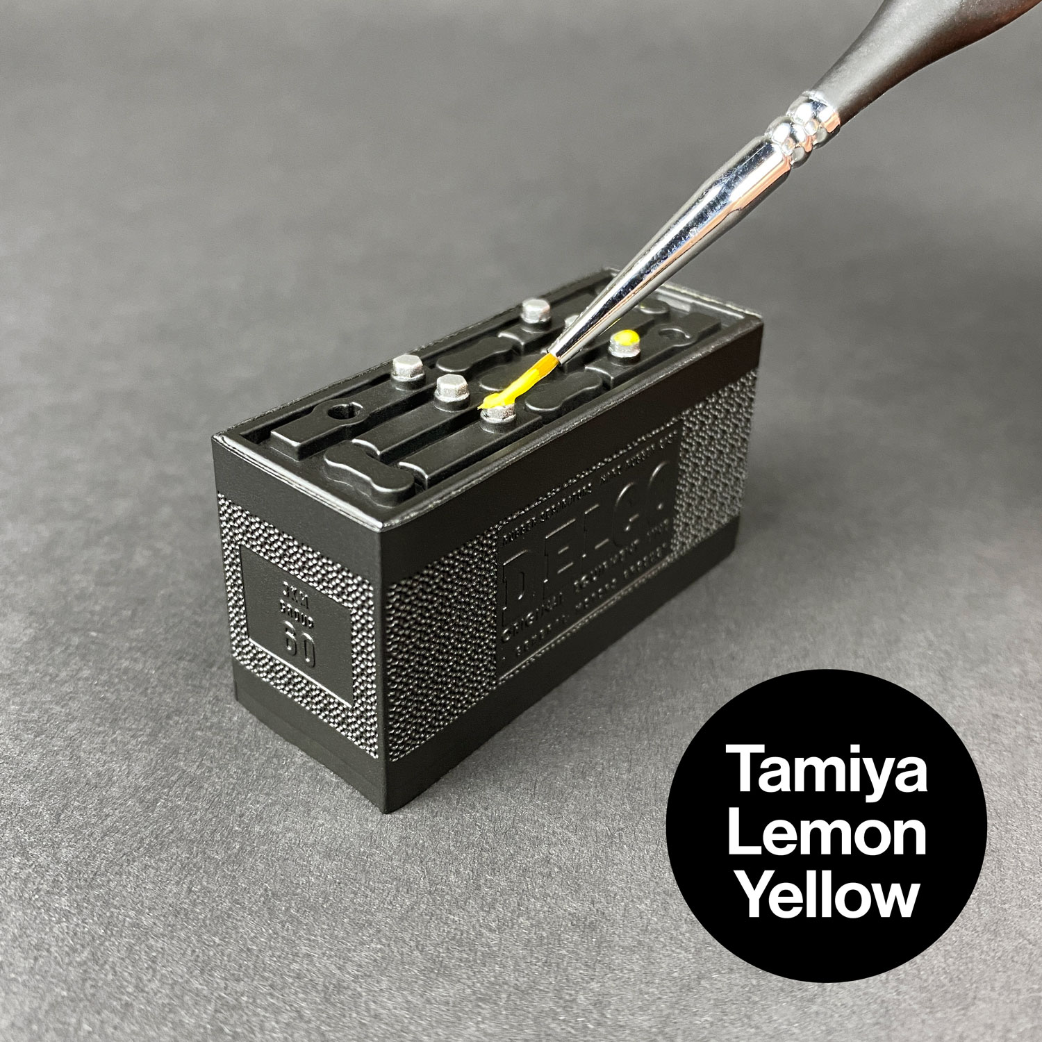 Painting Ecto-1 battery caps with Tamiya Lemon Yellow